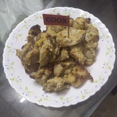 Tasty Murgh Malai Tikka cooked by COOX chefs cooks during occasions parties events at home