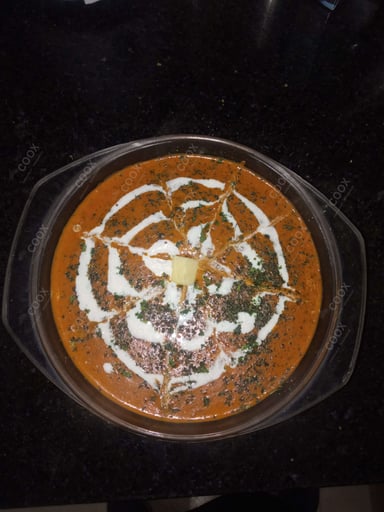 Tasty Dal Makhni cooked by COOX chefs cooks during occasions parties events at home