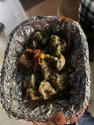 Tasty Murgh Malai Tikka cooked by COOX chefs cooks during occasions parties events at home