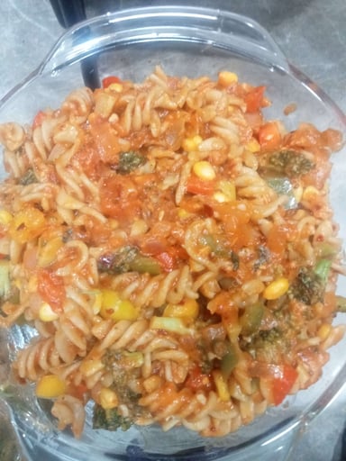 Tasty Pasta in Red Sauce cooked by COOX chefs cooks during occasions parties events at home