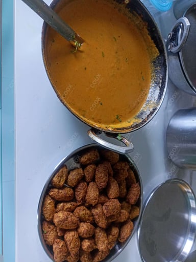Tasty Lauki Kofta cooked by COOX chefs cooks during occasions parties events at home