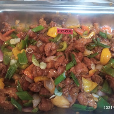 Tasty Chilli  Chicken cooked by COOX chefs cooks during occasions parties events at home