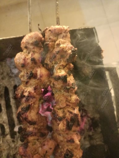 Tasty Murgh Malai Tikka cooked by COOX chefs cooks during occasions parties events at home
