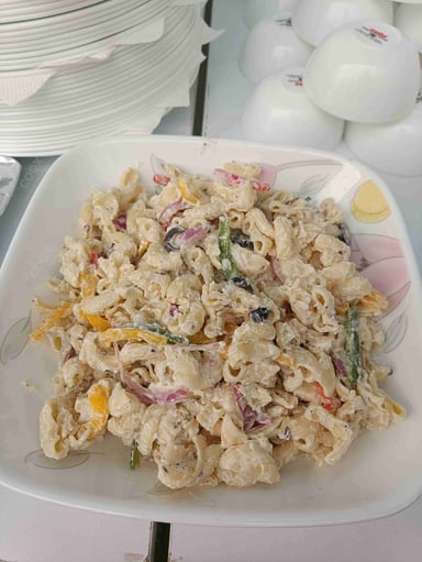 Tasty Macaroni Salad cooked by COOX chefs cooks during occasions parties events at home