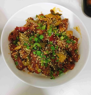 Tasty Crispy Chilli Baby Corn cooked by COOX chefs cooks during occasions parties events at home