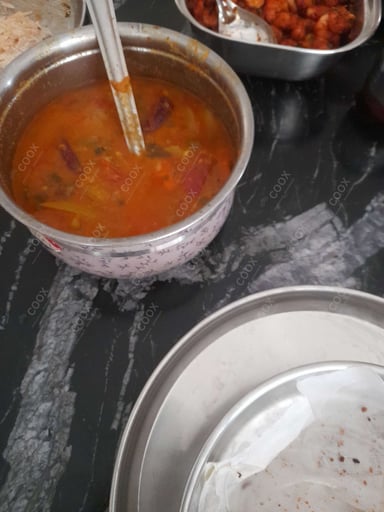 Tasty Sambhar cooked by COOX chefs cooks during occasions parties events at home