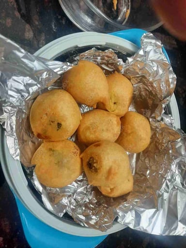 Tasty Aloo Bonda cooked by COOX chefs cooks during occasions parties events at home