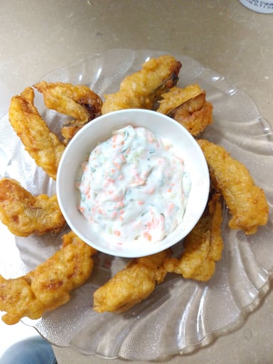 Tasty Fish Orly cooked by COOX chefs cooks during occasions parties events at home