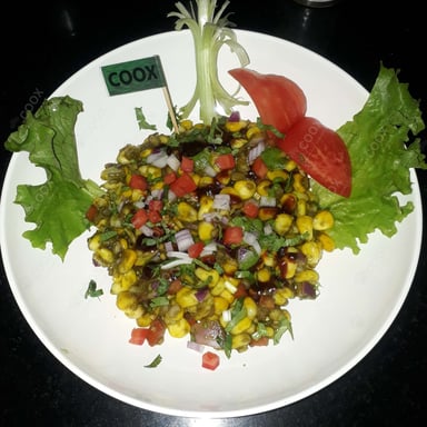 Tasty Corn Chaat cooked by COOX chefs cooks during occasions parties events at home
