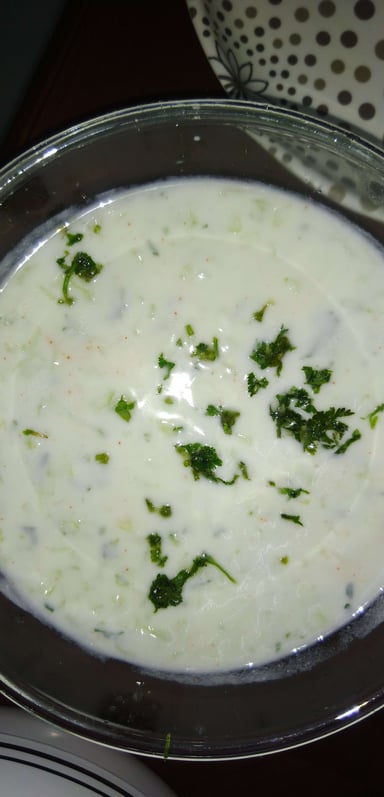 Tasty Mix Veg Raita cooked by COOX chefs cooks during occasions parties events at home