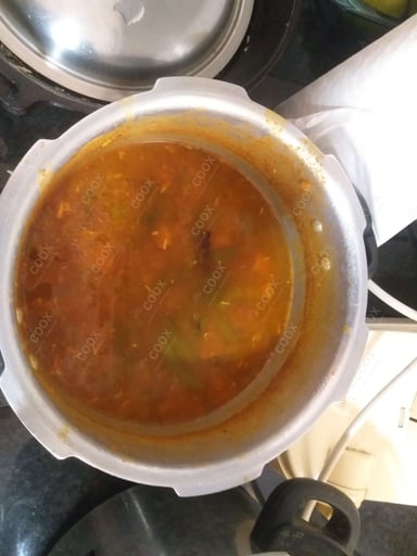 Tasty Sambhar cooked by COOX chefs cooks during occasions parties events at home