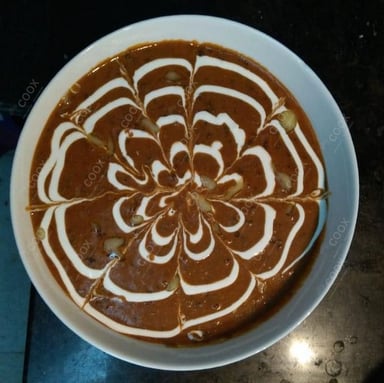 Tasty Dal Makhni cooked by COOX chefs cooks during occasions parties events at home