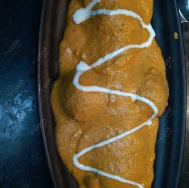Tasty Malai Kofta (Orange Gravy) cooked by COOX chefs cooks during occasions parties events at home
