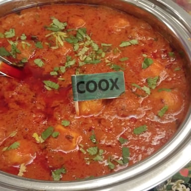 Tasty Dum Aloo cooked by COOX chefs cooks during occasions parties events at home