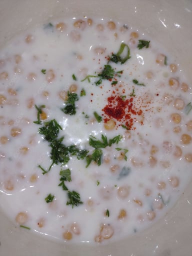 Tasty Boondi Raita cooked by COOX chefs cooks during occasions parties events at home