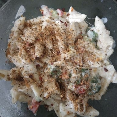 Tasty Pasta in White Sauce cooked by COOX chefs cooks during occasions parties events at home