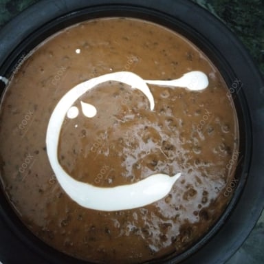 Tasty Dal Makhni cooked by COOX chefs cooks during occasions parties events at home