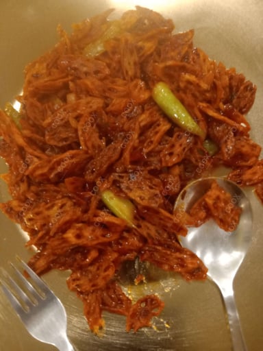 Tasty Chilli Lotus Stem cooked by COOX chefs cooks during occasions parties events at home