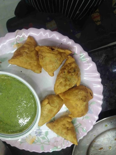 Tasty Keema Samosas cooked by COOX chefs cooks during occasions parties events at home