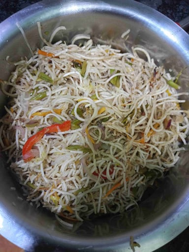 Tasty Chicken Hakka Noodles cooked by COOX chefs cooks during occasions parties events at home