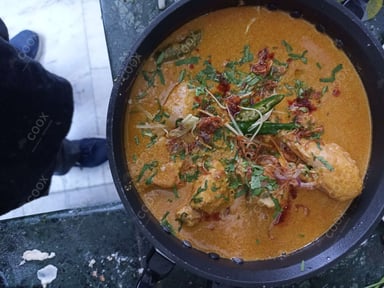 Tasty Malabar Parotta cooked by COOX chefs cooks during occasions parties events at home