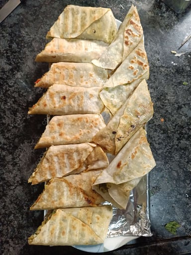 Tasty Chicken Kathi Rolls cooked by COOX chefs cooks during occasions parties events at home