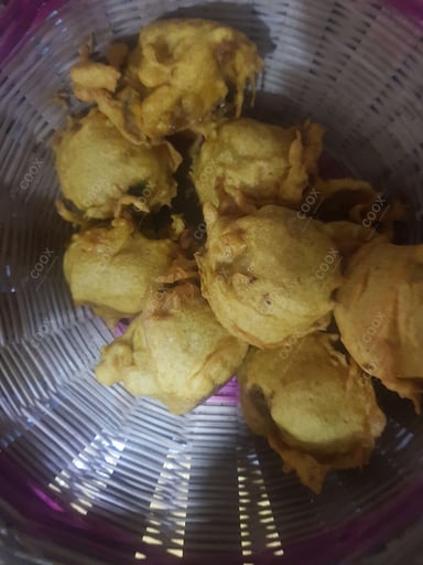 Tasty Aloo Bonda cooked by COOX chefs cooks during occasions parties events at home
