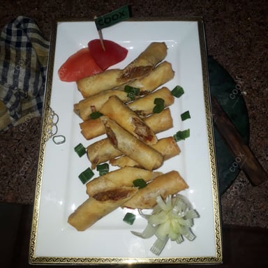 Tasty Veg Spring Rolls cooked by COOX chefs cooks during occasions parties events at home