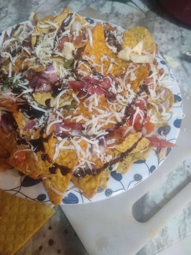 Tasty Cheese Nachos cooked by COOX chefs cooks during occasions parties events at home