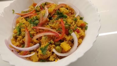 Tasty Poha cooked by COOX chefs cooks during occasions parties events at home