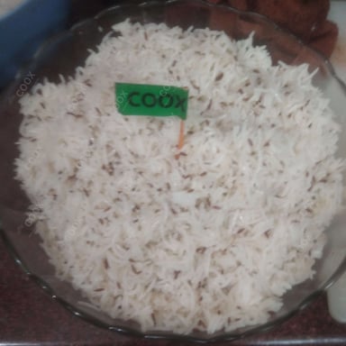 Tasty Jeera Rice cooked by COOX chefs cooks during occasions parties events at home