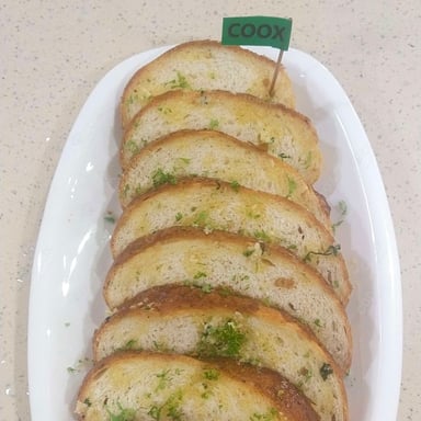 Tasty Garlic Bread with Cheese cooked by COOX chefs cooks during occasions parties events at home