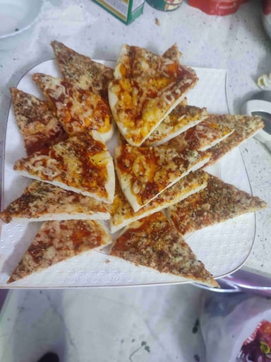 Tasty Margherita Pizza cooked by COOX chefs cooks during occasions parties events at home