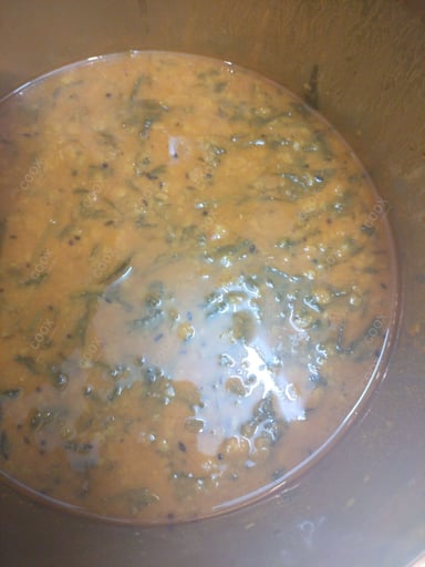 Tasty Palak Dal cooked by COOX chefs cooks during occasions parties events at home