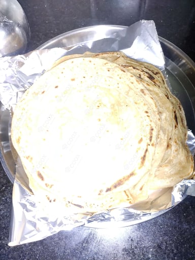 Tasty Tawa Rotis cooked by COOX chefs cooks during occasions parties events at home