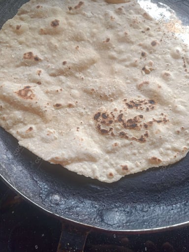 Tasty Tawa Rotis cooked by COOX chefs cooks during occasions parties events at home