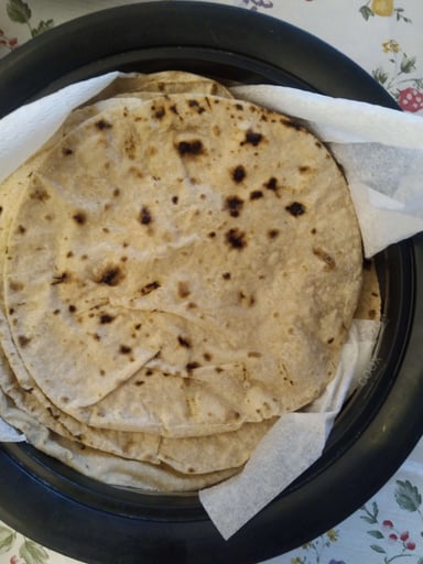 Tasty Tawa Rotis cooked by COOX chefs cooks during occasions parties events at home