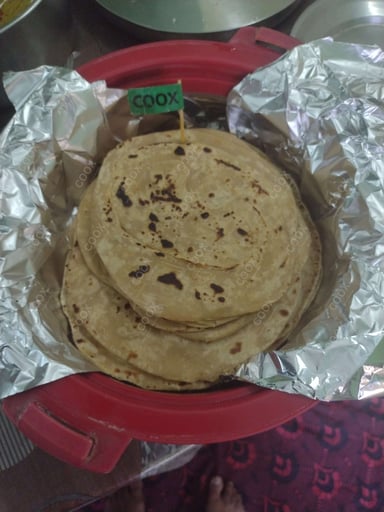 Tasty Tawa Rotis cooked by COOX chefs cooks during occasions parties events at home