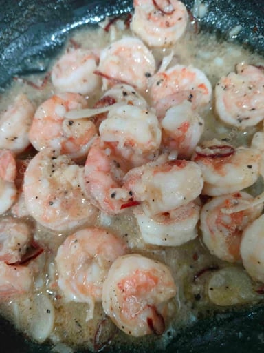 Tasty Butter Garlic Prawns cooked by COOX chefs cooks during occasions parties events at home