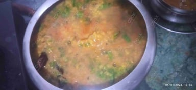 Tasty Palak Dal cooked by COOX chefs cooks during occasions parties events at home