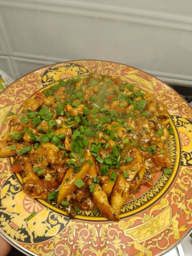 Tasty Chilli Chicken cooked by COOX chefs cooks during occasions parties events at home