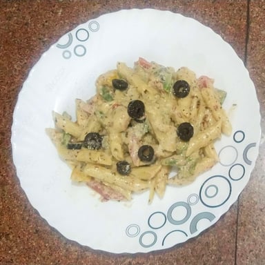 Tasty Pasta in White Sauce cooked by COOX chefs cooks during occasions parties events at home