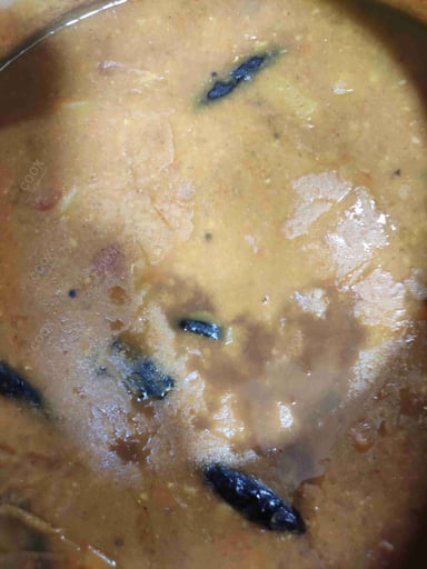 Tasty Sambhar cooked by COOX chefs cooks during occasions parties events at home