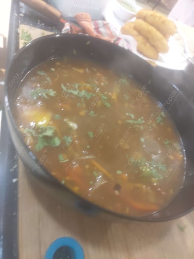Tasty Chicken In Burnt Garlic Sauce cooked by COOX chefs cooks during occasions parties events at home