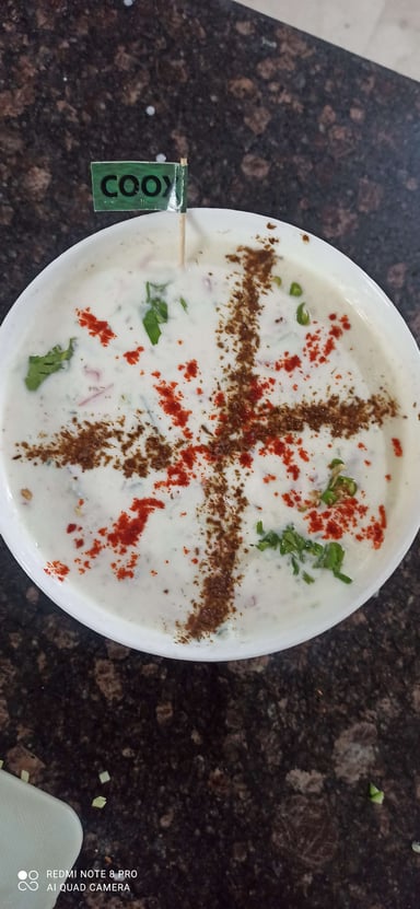 Tasty Mix Veg Raita cooked by COOX chefs cooks during occasions parties events at home