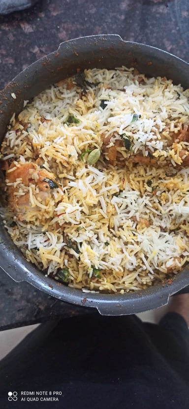 Tasty Chicken Biryani cooked by COOX chefs cooks during occasions parties events at home