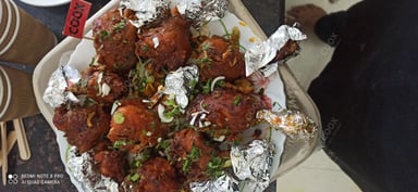 Tasty Chicken Lollipop cooked by COOX chefs cooks during occasions parties events at home
