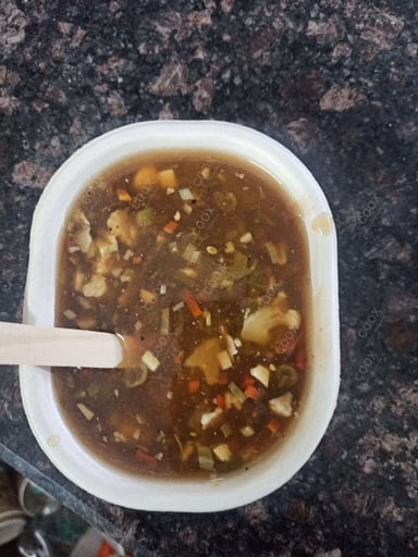 Tasty Hot & Sour Soup cooked by COOX chefs cooks during occasions parties events at home