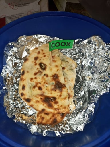 Tasty Naan (Butter / Garlic) cooked by COOX chefs cooks during occasions parties events at home
