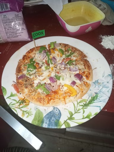 Tasty Veg Pizza cooked by COOX chefs cooks during occasions parties events at home